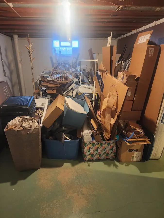 Roll-off dumpster container at job site for 2 Yard Dumpster Rental in Wheatfield